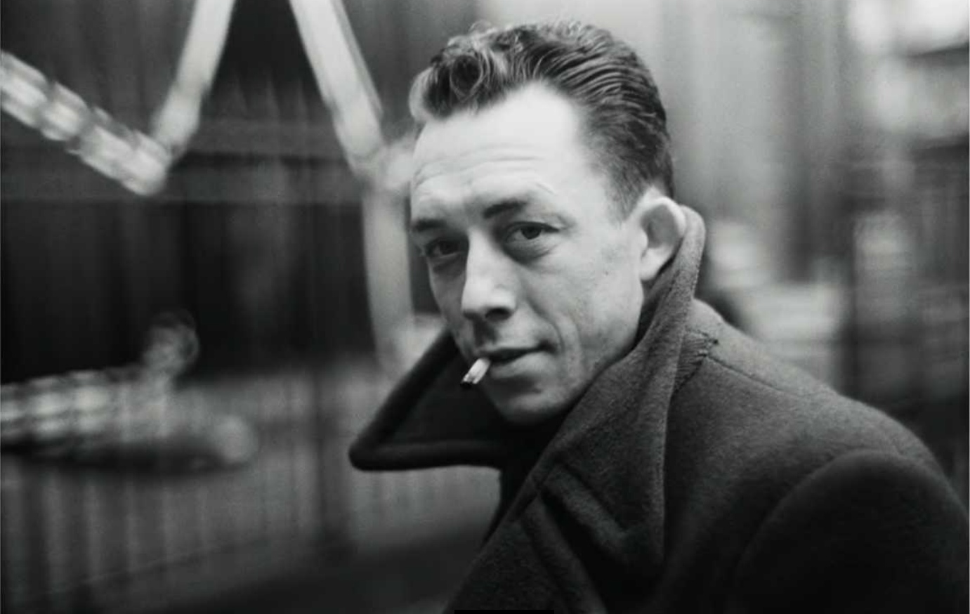 Black and White photo of Albert Camus with his cigarette